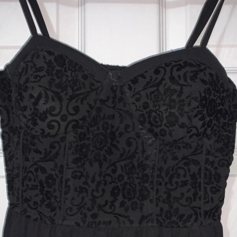 Black jumpsuit with floral detail